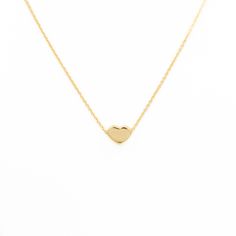 Get your hands on our Petite Heart Necklace by Kimberly James Jewelry! Perfect for any occasion, this stunning necklace is a must-have for your everyday wardrobe. Add a touch of love and style to your look with this piece. Details: Gold Plated over Brass E-coating for durability Elegant Heart Beads Round Pendant Necklace, Heart-shaped Delicate Chain Necklace For Mother's Day, Heart Shaped Delicate Chain Necklace For Mother's Day, Elegant Heart Beads Necklace With Round Pendant, Elegant Necklace With Heart Beads And Round Pendant, Delicate Heart Shaped Necklace For Mother's Day, Mother's Day Heart Necklace With Delicate Chain, Mother's Day Heart Cut Delicate Chain Necklace, Double Heart Beaded Necklaces As Gift For Her