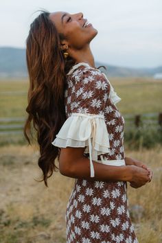 Embrace the fall season in our Becca Crochet Dress! Made with a beautiful brown and ivory crocheted floral fabric, this ankle-length dress features a round neckline and half-length fitted sleeves with cream ruffled detailing. The non-functional buttons add a touch of charm, while the hidden back zipper ensures a perfect fit. Ideal for any occasion, this women's dress is a must-have addition to your wardrobe. Thanksgiving Dress, Girls Holiday Dresses, City Woman, Ankle Length Skirt, Fitted Sleeves, Tie Length, Ankle Length Dress, White Dress Party, Baby Shower Dresses