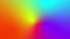 a blurry image of an orange, yellow and blue background with the light reflecting on it's surface