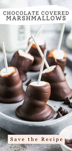 chocolate covered marshmallows on a baking sheet