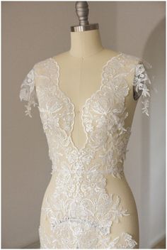 Beautiful Off-white sequin flower lace trim for exclusive and luxury wedding dresses  ❀❀ SAMPLE SWATCHES❀❀ If you want to check the color and quality, you can order a swatch here (READ DESCRIPTION OF THE LISTING  https://www.etsy.com/listing/733242442/sample-swatch-please-read-description?ga_search_query=sample&ref=shop_items_search_1&crt=1 Please note, that it can happen, that till you get your lace sample with air mail, the lace could be sold in this time.   Perfect for dress making, bridal we Fitted Cream Lace With Lace Patchwork, Fitted Cream Lace With Patchwork Detail, Fitted Lace Wedding Dress With Lace Bodice, Fitted Wedding Lace With Lace Back, Fitted Lace Back Dress For Weddings, White Fitted Lace Wedding Dress, White Lace Wedding Dress With Lace Patchwork, Fitted Cream Lace Wedding Dress, White Fitted Wedding Dress With Delicate Lace