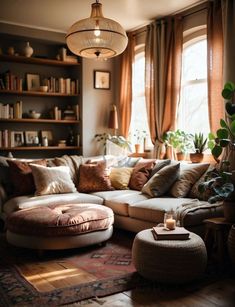 a living room filled with lots of furniture next to a window covered in bookshelves