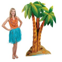 a woman standing in front of a palm tree cutout with the image of an island behind her