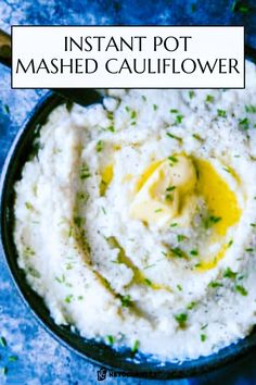 instant pot mashed cauliflower in a black bowl