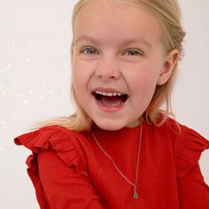 This charming Christmas tree enamel pendant is a fun holiday accessory for little girls. With its luscious green enamel colors and polished silver ornaments, it brings the holiday spirit to any outfit. Made from hypoallergenic 925 sterling silver, it's safe for young girls with sensitive skin. Whether worn as a festive accent or a sentimental reminder of the holidays, this enchanting pendant is sure to be a treasured addition to any young girl's jewelry collection. Gift box included. Christmas Tree Kids, Charming Christmas, Silver Ornaments, Kids Necklace, Tree Pendant, Delicate Jewelry, Green Enamel, Christmas Jewelry, Girls Jewelry