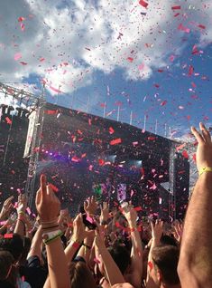 confetti is thrown in the air at a concert