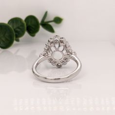 This diamond ring semi-mount features a diamond halo with 3 sizes of round diamonds and Milgrain detailing. The oval basket is double-pronged making this setting secure and fit to last a lifetime! It comfortably fits an oval-shaped gemstone without any alterations. Oval Basket, Designer Silver Jewellery, Jewelry Showcases, Oval Ring, Oval Rings, Earring Findings, Baguette Diamond, Pendant Bracelet, Diamond Halo