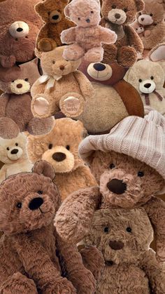 a group of teddy bears sitting next to each other