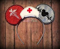 two mickey mouse ears with red and silver sequins, one has a nurse's hat on it