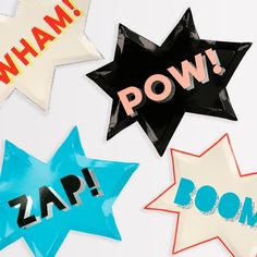 four star shaped balloons with the words pow and zap boom written on them