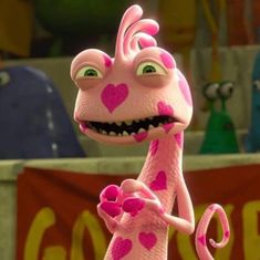 the pink giraffe has hearts on it's face and is waving to someone