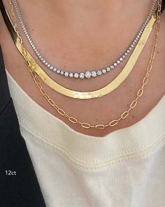 Graduating white diamonds beautifully balance this fierce tennis necklace. Available in two carat weights for your perfect layered look with our Herringbone Chain Necklace. Elegant Diamond Chain Necklace With Vvs Clarity, Diamond White Chain Necklace With Diamond Cut, Diamond White Diamond Cut Chain Necklace, Formal Vvs Clarity Cubic Zirconia Chain Necklace, Elegant 14k Gold Tennis Necklace With Vvs Clarity, Elegant Chain Necklace With Brilliant Cut, Elegant Diamond Chain Necklace With Diamond Accents, Elegant Diamond Chain Necklace With Accents, Anniversary Diamond Cut Cubic Zirconia Chain Necklace