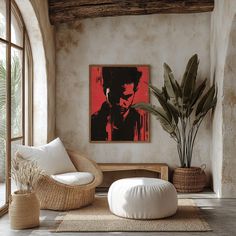 a living room filled with furniture and a painting on the wall next to a potted plant