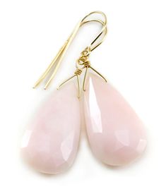 Pink Peruvian Opal earrings. Beautiful shade of soft pink in a faceted teardrop cut. High quality french earwires - either 14k solid yellow gold or 14k gold filled or sterling silver available - you choose. Gemstone size is 15x25mm, over 30 carats, earrings hang 1.5 inches. Naturally lightweight to wear for larger earrings. The mannequin shows the relative size and how they will hang. Please check out my store for more gemstone earrings, bracelets and necklaces. Faceted Briolette Teardrop Earrings, Elegant Pink Teardrop Earrings, Classic Pink Drop Jewelry, Elegant Pink Faceted Earrings, Peruvian Opal, Earrings Pink, Opal Earrings, Large Earrings, Tear Drop