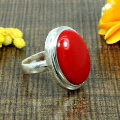 About The Ring:- 925 Sterling Silver Unisex Ring Chinese Red Coral Gemstone Ring Handmade Ring Spiritual Ring Western Ring Girls Gift Ring Engagement Jewelry Description : Gemstone : Synthetic Red Coral Stone Size : 19 x 14 MM Approx Stone Shape :- Oval Stamp :- 925 Weight : 8.37 Gram Approx handmade Item Made to order Processing Time :- This is handmade item and we need 3-5 days to ship your order . Delivery Time :- Once Item is shipped parcel will delivered to you in 2-4 weeks . Classic Adjustable Red Ring, Red Sterling Silver Round Rings, Ruby Ring With Polished Finish As Gift, Red Open Ring Stamped 925, Handmade Red Sterling Silver Rings, Red Sterling Silver Ring Gift, Red Sterling Silver Open Ring, Red Rings Stamped 925 As Gift, Handmade Red Open Ring