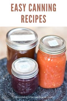 three jars filled with different colored jams and the words canning questions on top of them