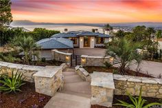 this is an aerial view of a house with stairs leading up to the front door