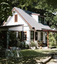 a bicycle is parked in front of a house