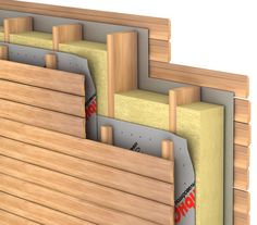 some wood planks are stacked on top of each other