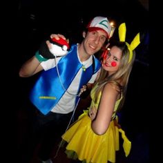 two people dressed up as pokemon and pikachu, one holding a nintendo wii controller