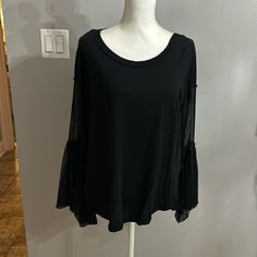 Very Cute And Comfy Oversized Black Free People Brand Blouse,Brand New No Tags,Fits Medium And Large Because Of The Style Fall Black Blouse With Sheer Sleeves, Black Blouse With Sheer Long Sleeves, Black Blouse With Sheer Sleeves For Fall, Black Stretch Blouse With Sheer Sleeves, Oversized Black Long Sleeve Top For Spring, Fall Black Top With Sheer Sleeves, Black Tops With Sheer Sleeves For Fall, Black Top With Sheer Sleeves For Fall, Trendy Black Blouse With Sheer Sleeves