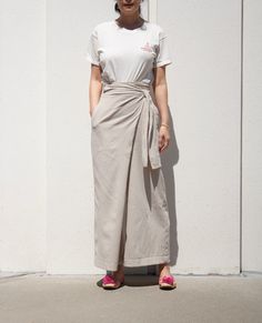 "Beat the heat with this cool loose cotton wrap pants Wide-leg fit is easy and casual with waist tie to give more shape Constructed to tie around waist It simply is super comfortable to wear and easy to pair with any summer tops -Made of light cotton -Sits on natural waist -Wrap around tie -Relaxed fit -24\" inseam *Material- cotton *Care-Machine Wash cool delicate / No chlorine bleach / Tumble Dry low / cool iron *Mode is 26\" waist, 36\" hips, and 5'3\" and she is wearing size small *See the r Wide Leg Summer Pants, Beige Trouser, Beige Hose, Dark Brown Pants, Summer Linen Pants, Everyday Skirts, Mid Calf Skirt, Maxi Pants, Navy Pencil Skirt