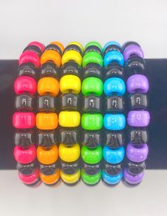 a group of multicolored objects sitting on top of each other