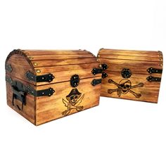 two wooden chests with pirate symbols painted on the front and back, side by side