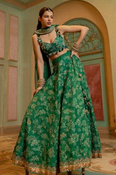 Emerald green lehenga with floral jacquard woven motifs and sequin, zari thread embroidery. Paired with sleeveless woven padded blouse and border embroidered dupatta. - Aza Fashions Green Art Silk Set For Reception, Green Sets With Zari Work For Reception, Green Brocade Choli With Dupatta, Green Brocade Saree With Resham Embroidery, Green Brocade Lehenga For Reception, Green Brocade Sharara For Reception, Green Brocade Sharara For Wedding, Green Brocade Dress With Dupatta, Green Brocade Sets For Wedding