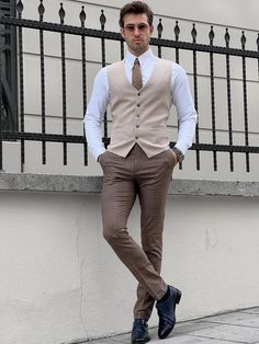 NEW COLLECTİON - FW / 23Collection: Fall / Winter - 23Production: Private Collection Slim-fit Wool Beige Men’s WaistcoatProduct color: BEİGEProduct material: %40 Wool , %30 Viscon , %25 Polyester , %5 ElestanProduct details: The waistcoat is adjustable from the back.Product care: Dry clean onlyProduct size: 48-50-52-54-56-58Package İncluded : Waistcoat Dimensions of the mannequin: 185cm / 78kg , Size : 50EU / 40US Cream Vest Outfit Men, Cream Vest Outfit, Vest Dress Outfit, Brown Vest Men, Vest Outfits Men, Classy Outfits Men, Boys Vest, Beige Pants, Elevated Style