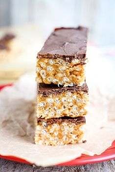 three pieces of chocolate and oatmeal bars stacked on top of each other