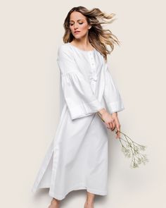 Classic white never goes out of style. Crisp, versatile, and always on-trend. The effortless Seraphine nightgown unites comfort and grace in a supple lightweight flannel. Soft bell sleeves, button detail and an a-line silhouette. The fabric is made from 100% of the finest quality cotton. It is yarn-dyed to prevent fade and brushed for added softness making the sleepwear feel absolutely luxurious, getting cozier after each wash. You will be tucked in luxury and off to dreamland. Bonne nuit. White Flannel, Flannel Women, Shoe Size Conversion, Getting Cozy, Shoe Size Chart, Button Detail, Yarn Dyeing, Out Of Style, Classic White