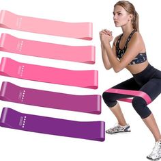 a woman is squatting with her arms crossed in different colors and styles of resistance bands