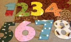 the numbers are made out of paper and decorated with magnets to spell out their age