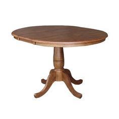 a round wooden table with four leaves on the top and one leaf at the base