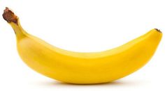 a yellow banana sitting on top of a white table