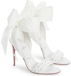 Christian Louboutin Wind Around 100 White Lace Up Tie Bridal Sandal Heel Pump 41 ********** Christian Louboutin ********** Brand: Christian Louboutin Size: 41 (know your Louboutin size)  Name: Wind Around Color: White-Beige / White Style: Lace Up Sandal Style#: 3220398 Material: Elastique / NY Phospo Peep open front toe Logo front toe band Standing on a 100mm heel Windproof fabrics take on glam vibes as the signature logo-embroidered mesh toe strap and ostentatious ankle-wrapping bow on this stiletto sandal with an iconic red sole Side zip; wraparound ankle strap with tie closure Textile upper/leather and textile lining/leather sole Made in Italy Perfect for the bride on her wedding day or a bridal shower Lace up tie ankle straps Thin back heel Classic red leather sole Brand new in box, co Louboutin Heels Wedding, White Louboutin Heels, White Louboutin, Louboutin Wedding Shoes, Bridal Sandal, Bridal Sandals Heels, Christian Louboutin Wedding Shoes, Bridal Sandals