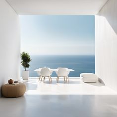 Image of a minimalist interior with a sea view. The white walls, clean lines, and neutral tones create a soothing ambiance. The large windows beautifully frame the ocean landscape. It's a harmonious and serene space, perfect for relaxing while admiring the beauty of the sea. Atami, Ocean Landscape, Sea View, Minimalist Interior, Large Windows, A Sea, Neutral Tones, White Walls