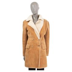 100% authentic Jitrois double breasted coat in beige suede (missing tag). Comes with two slit pockets on the front. Closes with buttons on the front. Lined in off-white shearling fur. Has been worn and shows some soft signs of wear allover and has missing velcro shoulder pads. Overall in very good condition. Measurements Size XS Shoulder Width 46cm (17.9in) Bust From 88cm (34.3in) Waist From 74cm (28.9in) Length 97cm (37.8in) Sleeve Length 62cm (24.2in) All our listings include only the listed i Double Breasted Jacket, Double Breasted Coat, Outerwear Coats, Shoulder Pads, Double Breasted, Overalls, Coats Jackets, Off White, Sleeve Length