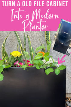 a planter with flowers and plants in it that is next to the wall, has text overlay reading how to turn an old file cabinet into a modern planter