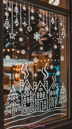 Transform your ordinary window into a magical winter wonderland with this easy DIY project. This charming scene, featuring snow-capped houses, twinkling stars, and festive bells, will bring a touch of holiday cheer to your home. Perfect for spreading joy and creating a cozy atmosphere. #ChristmasDecor #DIYChristmas #WinterDecor #HolidaySeason #WindowArt #ChristmasIdeas #WinterVibes #FestiveHome #DIYProjects #HomeDecor #WinterWonderland #Snowflakes #ChristmasLights #BellDecorations #CozyHome #WinterFun #HolidayCheer #ChristmasSpirit #DIYInspiration #HomeImprovement #HolidayTips Christmas Window Painting Houses, Paint Pen Window Art Christmas, Christmas Window Cricut, Window Snowflakes Diy, Winter Storefront Window Displays, Boutique Holiday Window Display, Winter Wonderland Window Display Ideas, Xmas Windows Display, Happy Holidays Window Art