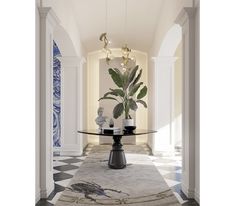 a room with a glass table and some plants on the rug in front of it