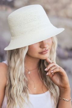 Timeless and versatile, with a crochet finish style, from the beachside to the city life, it really can be styled with just about anything. White Straw Bucket Hat With Wide Brim, White Wide Brim Straw Bucket Hat, Casual Lightweight Natural Bucket Hat, Lightweight Natural Color Casual Bucket Hat, Lightweight Paper Straw Bucket Hat For Spring, Chic Beige Straw Bucket Hat, Chic Straw Brimmed Bucket Hat, Trendy Flat Brim Bucket Hat For Vacation, Chic Brimmed Straw Bucket Hat