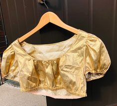 0s top Gold puffy sleeved metallic cropped top blouse siZe xs s  Nonstretchy material Condition good Measurements bust 51 cm x2 lenght front neckline to hem 17cm (to underbust)  sleeve 21 cm sleeve circumference 30cm  12 inches 70s Tops, Cropped Top, Finland, Crop Tops, Gold