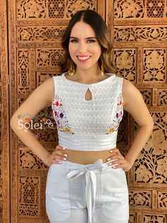 This modern style Two Piece Jumpsuit with a traditional Mexican look is the perfect outfit to add to your wardrobe. It has beautiful hand embroidered flowers, embroidered with Silk Thread and lace details on the Top. The top and pants both have elastic in the back for an adjustable fit. This outfit is made with love by Mexican Artisans in Oaxaca, Mexico. Note: It comes in one size which fits sizes Small and Medium. More colors available here: https://www.etsy.com/es/listing/979071376/jumper-mexi Fitted Cotton Sets With Geometric Embroidery, Fitted Summer Embroidered Top With Geometric Design, Fitted Embroidered Top With Geometric Design For Summer, Fitted Summer Embroidered Top With Geometric Embroidery, Fitted Summer Top With Geometric Embroidery, Fitted Sleeveless Tops With Geometric Embroidery, Fitted Sleeveless Top With Geometric Embroidery, Fitted White Blouse With Geometric Embroidery, Flowers Embroidered