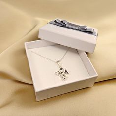 Necklace with an angel, guardian angel, for a child, a gift for the First Holy Communion, made of 925 silver. This beautiful necklace is a perfect gift for First Holy Communion, Confirmation, birthday for your loved ones ❤️ Each product purchased in our store is packed in a decorative box for FREE! 🎁 ❗️ All our products are made of the highest quality 925 silver. ❗️ 🏷️ Handmade jewelry 🏷️ The product is available in three color versions: 🤍 925 silver, 💛 gold-plated silver, 💗 silver plated Personalized Silver Jewelry Gift Box, Elegant Hallmarked Charm Necklaces As Gift, White Gold Necklaces With Charms For Gift, White Gold Necklaces With Charms As A Gift, Sterling Silver Charm Necklace As Gift, White Gold Charm Necklaces With Birthstone Gift, Sterling Silver Charm Necklaces As Gift, Personalized White Gold Charm Necklace For Gift, Sterling Silver Necklace With Gift Box