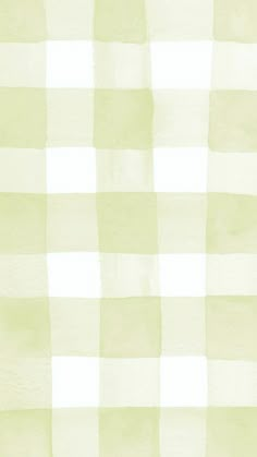 a white and green checkered wallpaper with some lines on the back ground in front of it