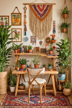 a room filled with lots of potted plants and hanging pictures on the wall above it