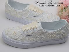 "Beautiful and Romantic wedding sneaker are a perfect accessories for your Special day..These Wedding White Authentic Vans Sneakers , are embellished with Ivory Lace fabric and Ivory applique . White Satin Ribbon shoe lace for tying ... Handmade to order, so please allow me enough time before your wedding date. Orders are processed and shipped within 5-6 WEEKS of payment., large orders may take longer ..Please allow an additional 2-5 days. Domestic Shipping will take 2-5 Business days. This Item Cream Lace-up Wedding Shoes For Ceremony, Lace-up Wedding Shoes With Laces, White Sneakers With Laces For Bridal Shower, Cream Wedding Shoes With Laces And Round Toe, Low-top Wedding Shoes With White Laces, Elegant Low-top Wedding Sneakers, Elegant Low-top Sneakers For Wedding, Cream Wedding Shoes With White Laces, Elegant Lace-up Wedding Sneakers