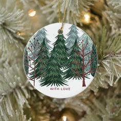 a christmas ornament hanging on a tree with the words, with love written in it